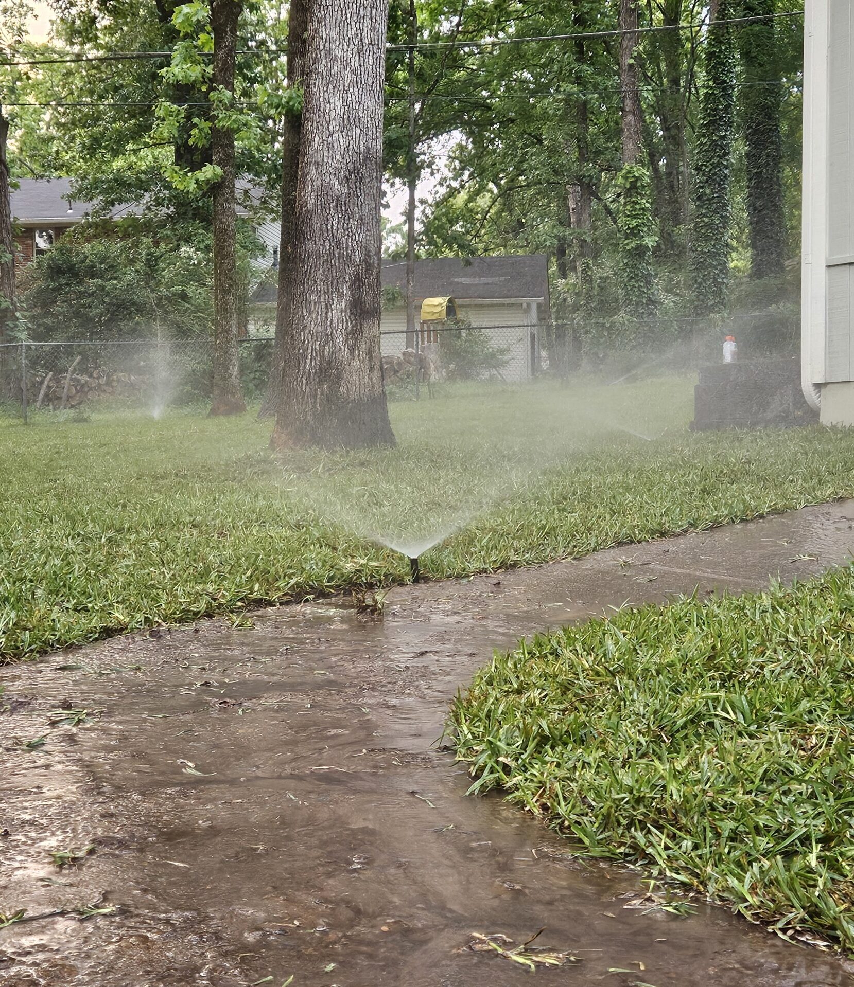 lawn sprinklers spraying